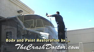 painting top of 35 foot motorhome at southern california's best motorhome and rv repair and paint restoration center www.thecrashdoctor.com